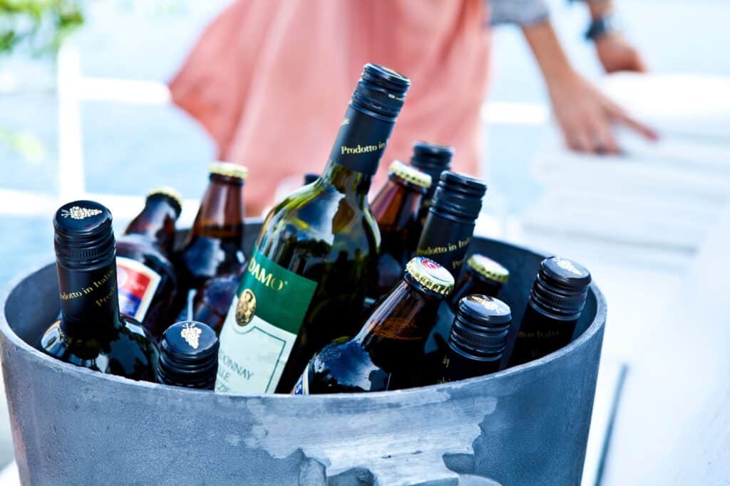 Beer and wine package bottles chilled on ice